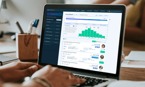 Nebula (2) Nurse helping a patient in hospital bed