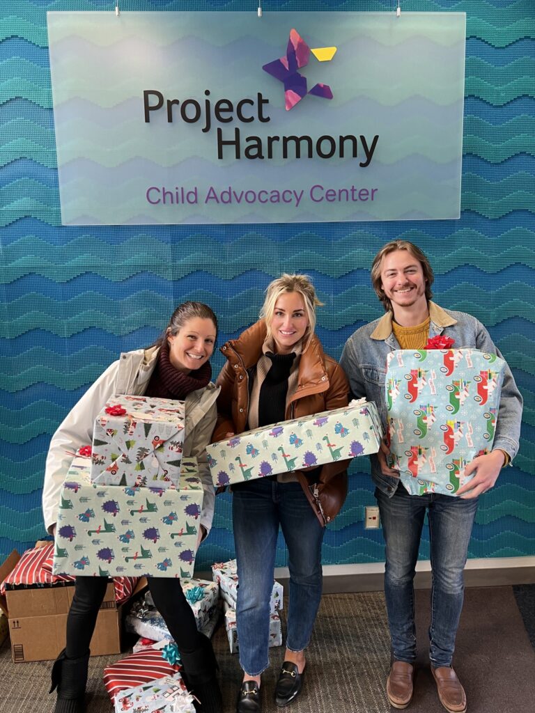 Uniti Med employee donation for the Presents for Project Harmony