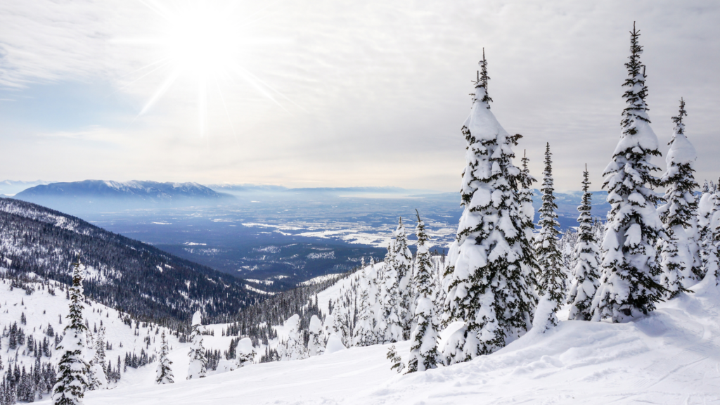 Snow-covered peaks and winter activities in Montana's Big Sky Country